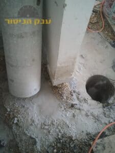 קידוח ברצפת בטון לצורך פתיחת קו ניקוז חדש בפרויקט בירושלים בשכונת הר נוף